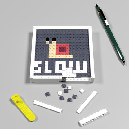 Pixel Art of Snail Compatible Lego Set - An Abstract Decoration with ‘SLOW’ Message